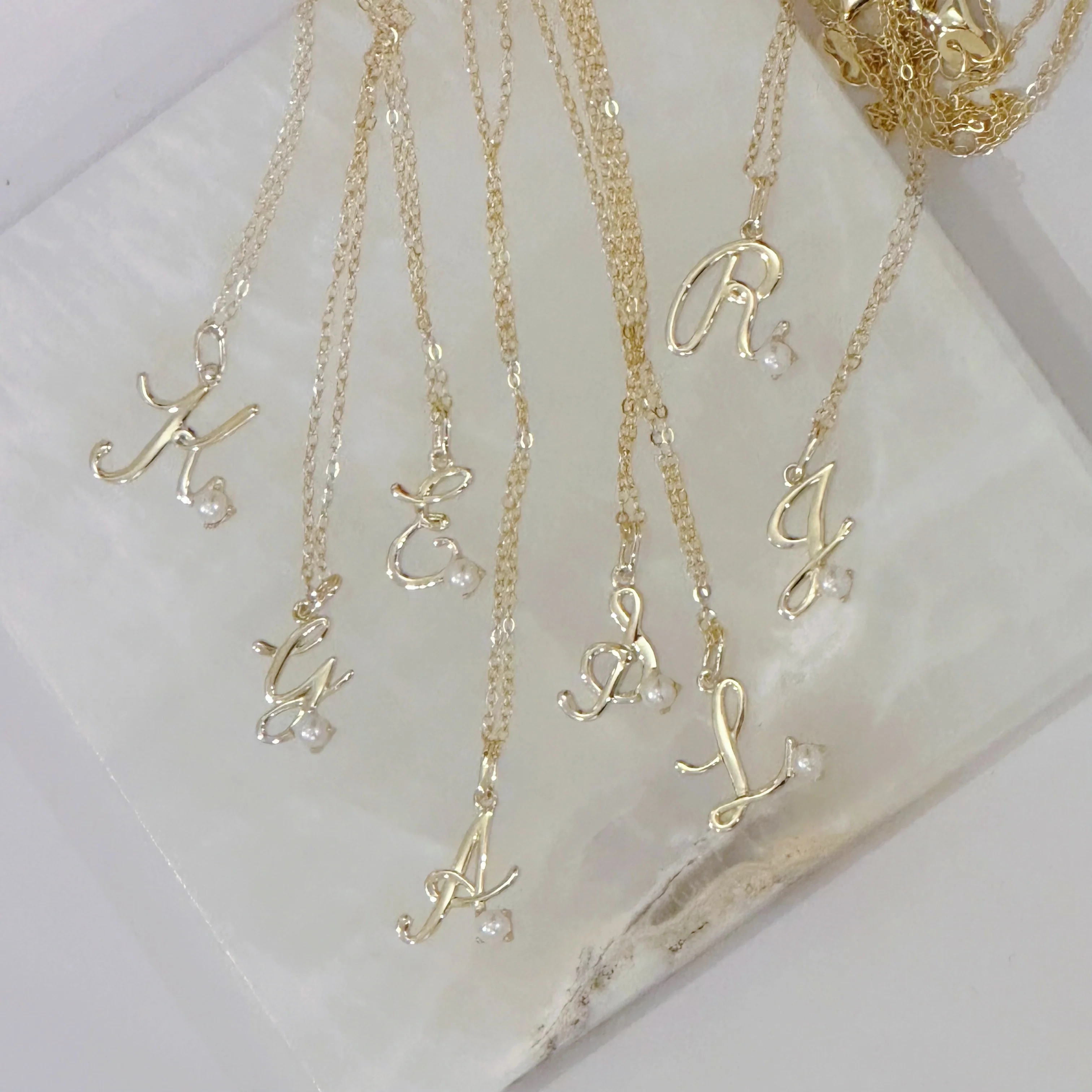 GOLD CURSIVE INITIAL PEARL MINI necklace - Image 2