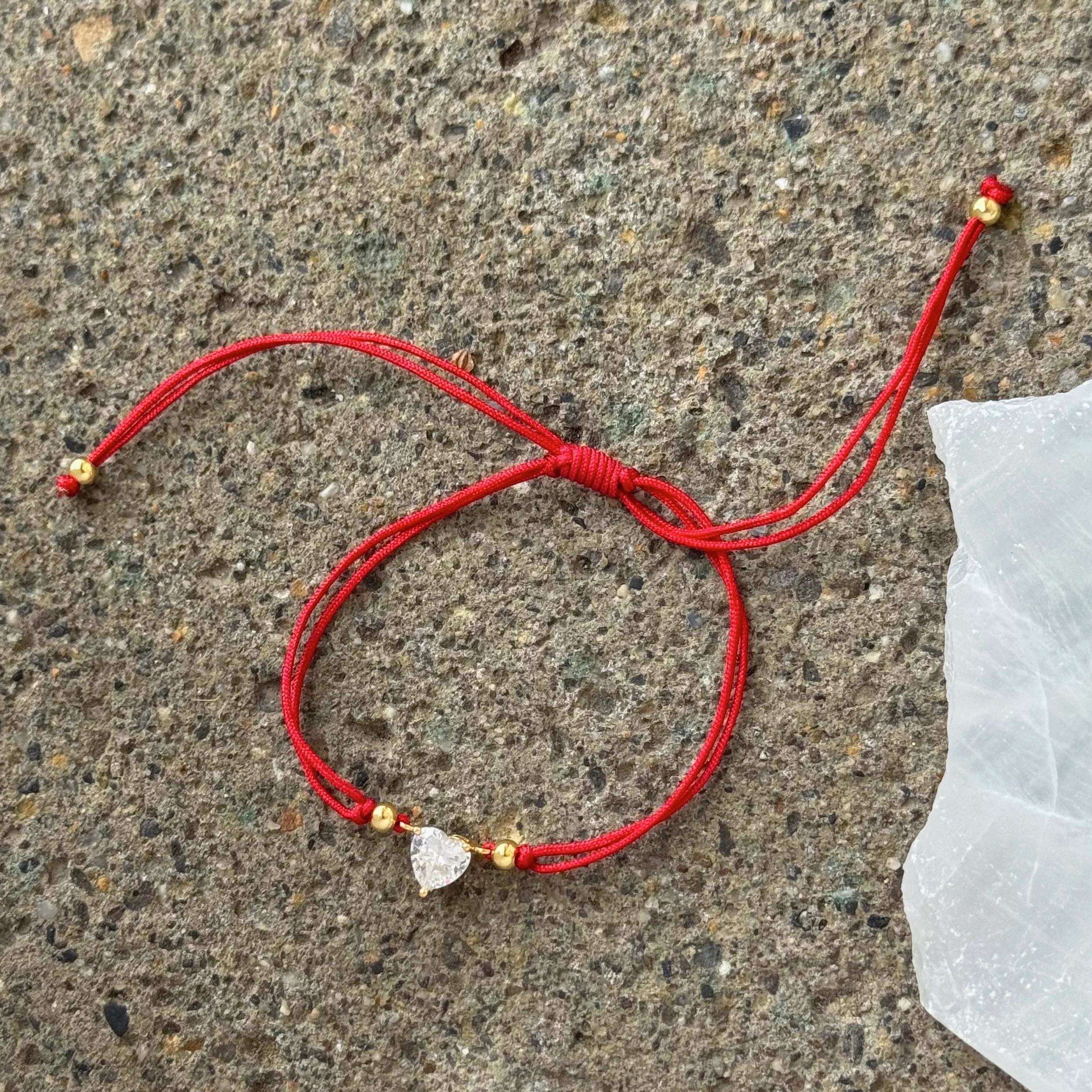 GOLD CRYSTAL HEART RED STRING bracelet
