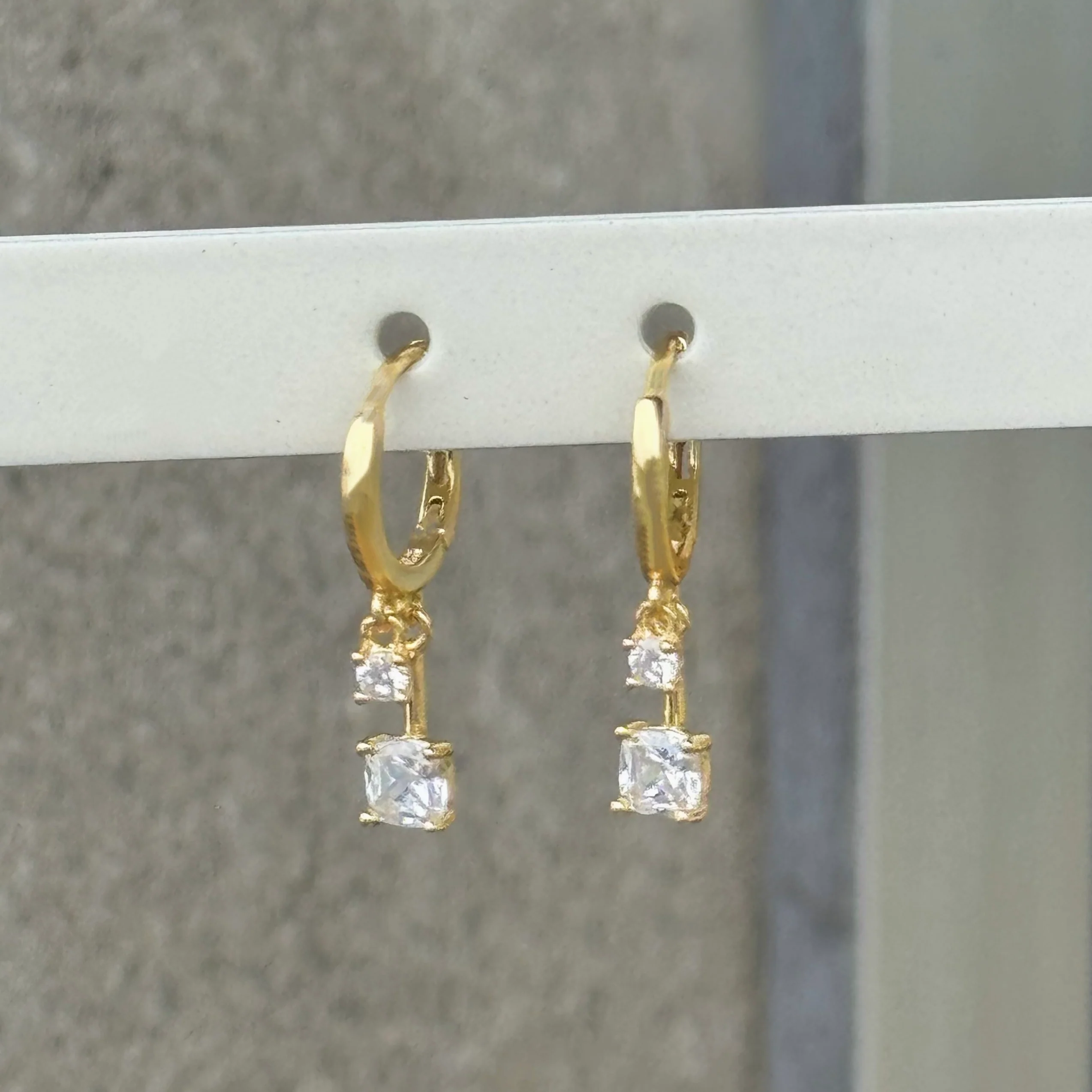 GOLD DOUBLE CRYSTAL DANGLE HUGGIE earrings