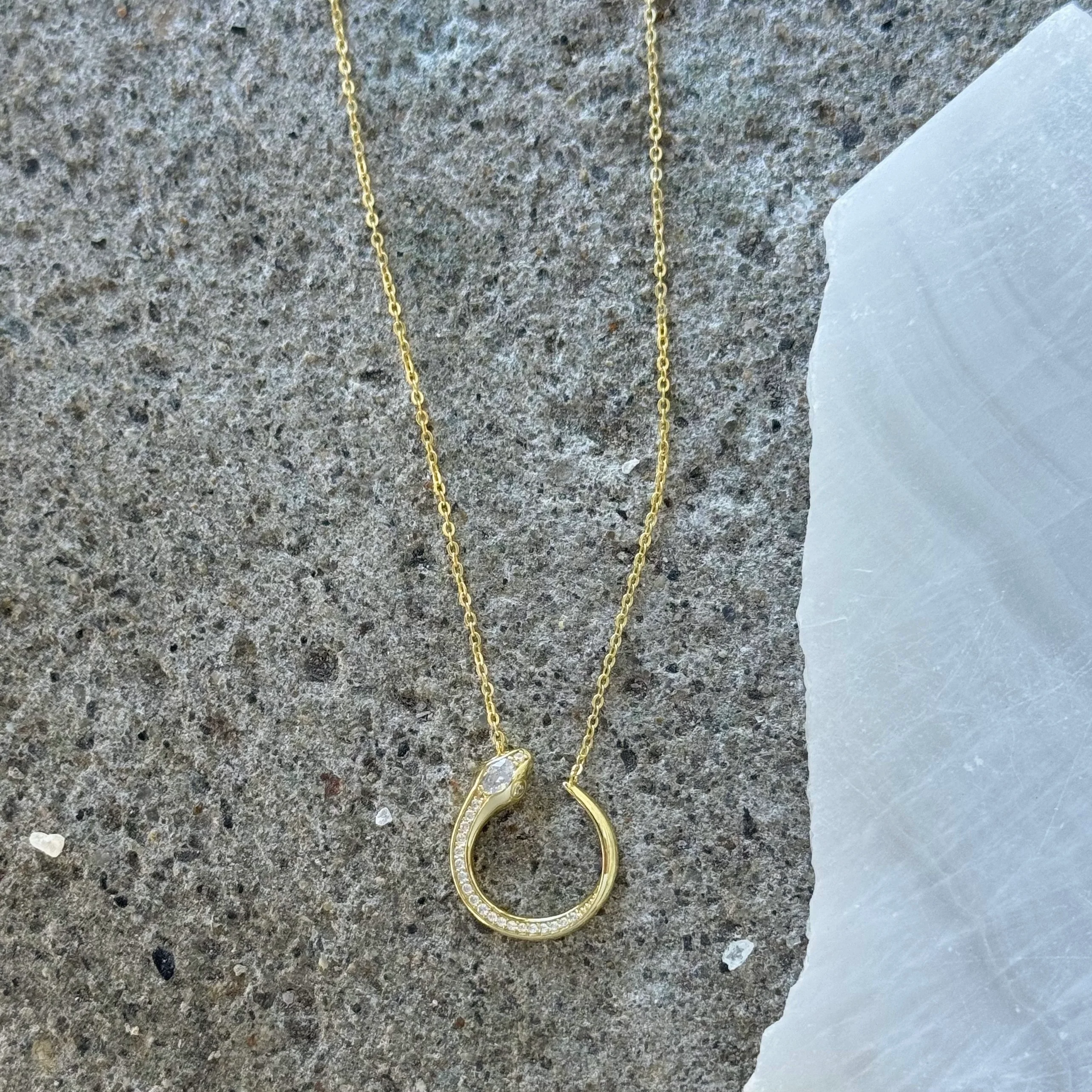 GOLD ROUND CRYSTAL SNAKE necklace